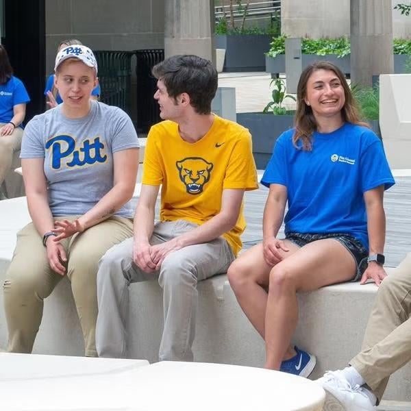 3 students talking