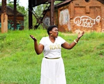 photo of a woman singing