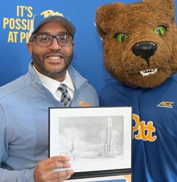Man posing with Roc